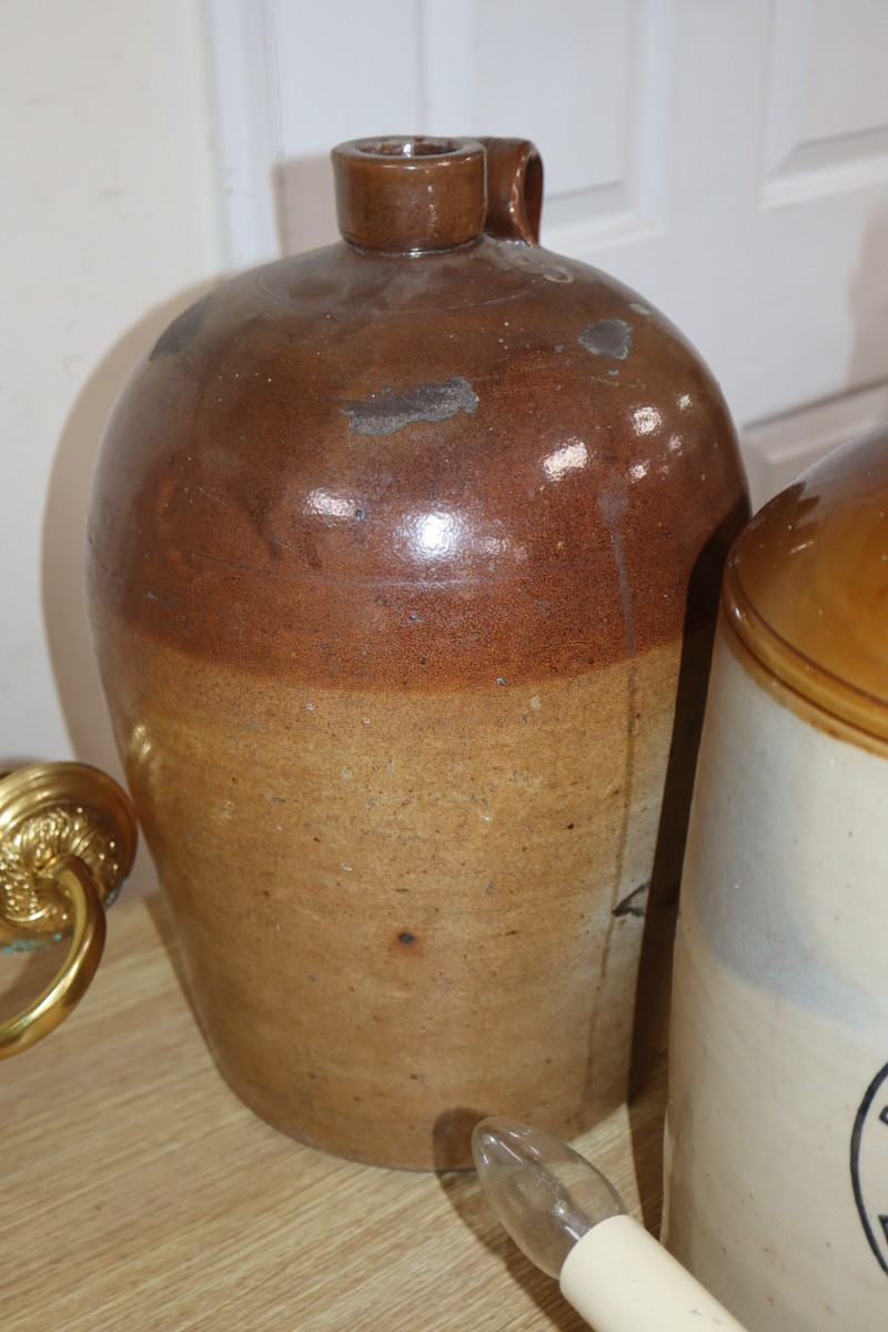 A D.T. Lyle & Sons Ltd stoneware lemonade flask and an earthenware jar (2)